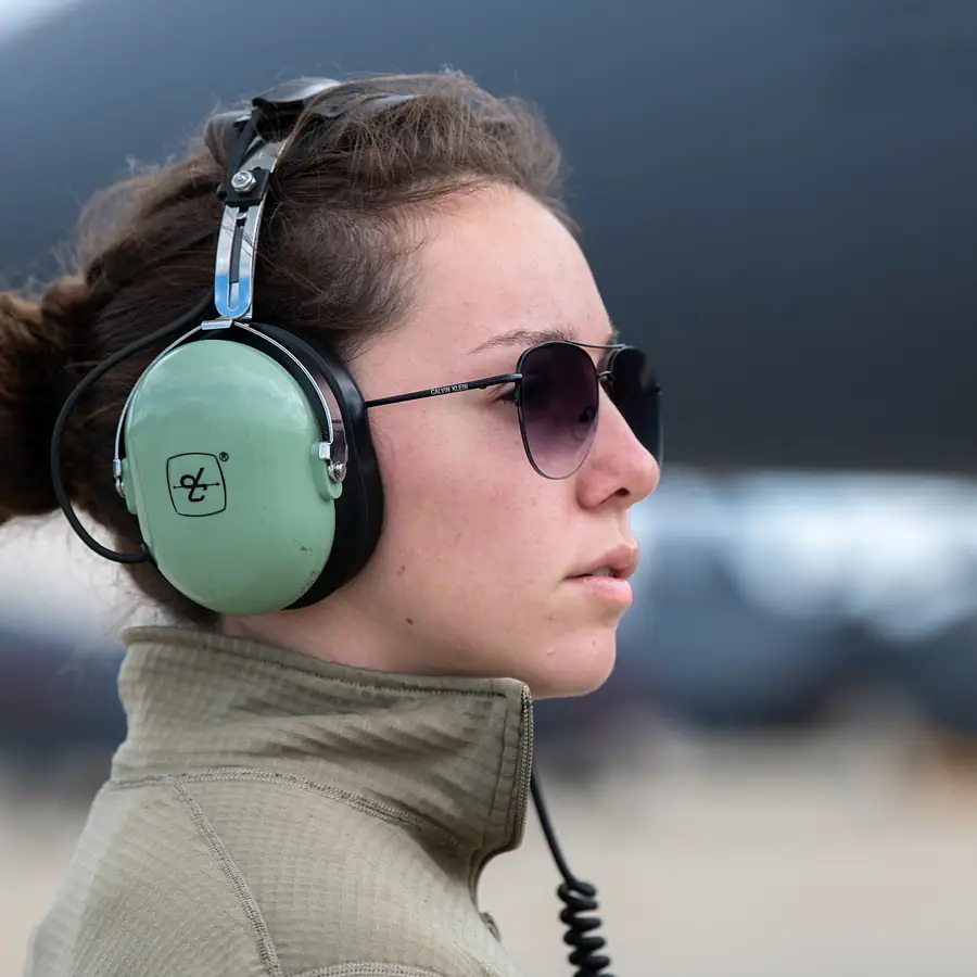 An Airman in hearing protection works the flight line at RAF Lakenheath.
